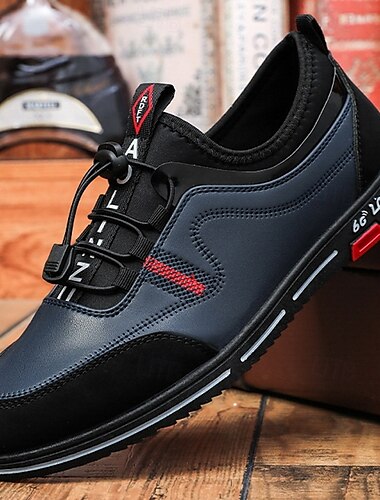  Hochwertige braun-schwarze Schnür-Sneaker aus Kunstleder für Herren mit buntem Branding für Freizeit- und Sportaktivitäten