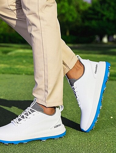  svarta och vita golfskor för män med spetsad sula, ventilerande ovandel och lätt design för komfort och stöd på golfbanan