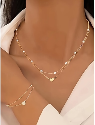  Conjunto de collar y pulsera con colgante de corazón de oro para mujer: delicada cadena en capas con perlas, elegante joyería romántica para regalos, bodas y uso diario.