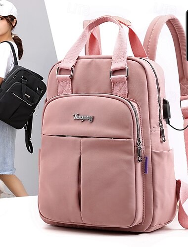  Mochila rosa con carga USB para mujer: elegante bolso de viaje y escolar impermeable con compartimento para portátil y correa para equipaje.