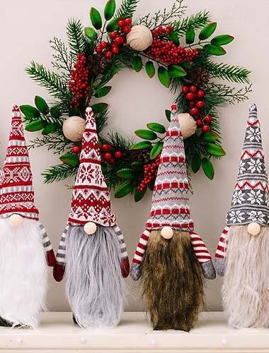  2 kpl jouluisia tonttuviinipullon suojuksia, nukke- ja pitkäpartaisia viinipusseja, juhlavia punaviini- ja samppanjakoristeita, joulupöytätarvikkeita, uudelleenkäytettäviä lahjapakkauksia,