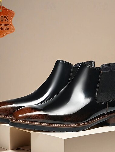 Мужские черные ботинки челси из натуральной кожи с полированной отделкой – элегантные ботинки без застежек для деловых встреч и вечерних мероприятий.   Мужские черные ботинки челси из натуральной кожи с полированной отделкой – элегантные ботинки без застежек для деловых встреч и вечерних мероприятий.