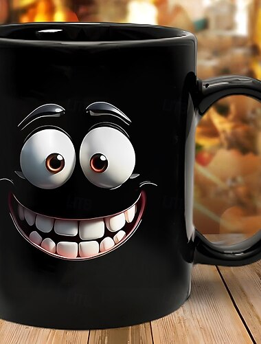  大きな笑顔の漫画の顔が描かれた面白い黒いコーヒーマグ。12オンスのセラミックティーカップ。オフィス、自宅、友人へのギフト、誕生日やホリデーのプレゼントに最適。