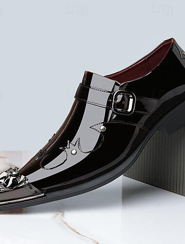  Zwarte herenloafers met decoratieve gesp, elegant ontwerp voor formele gelegenheden, bruiloften en speciale evenementen.