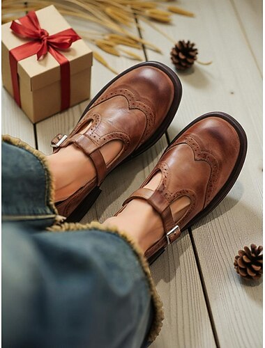  Braune Mary-Jane-Ballerinas aus Kunstleder mit Schnallendetail, klassischer und bequemer Stil, perfekt für Büro, Freizeit und Alltag.