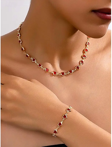  Conjunto de colar e pulseira com pingente em formato de coração, feito de liga metálica, disponível em diversas cores – acessório perfeito para o Natal e Dia dos Namorados.