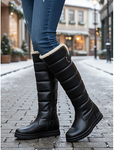  チャンキーヒールとタッセルディテールを備えた女性用の茶色のレースアップアンクルブーツ。カジュアルな外出に最適なジッパー開閉のスタイリッシュなブーツです。