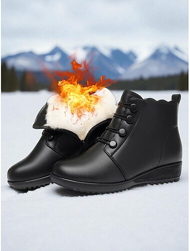  フェイクファーの裏地が付いたレディースの黒の冬用ブーツ。暖かく快適で、ジッパー付きのデザインで、寒い季節、オフィスやアウトドア活動に最適です。