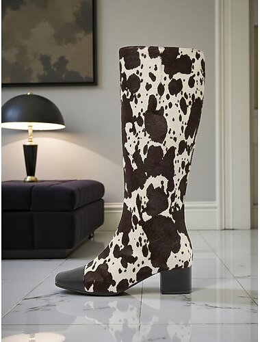  チャンキーヒール、ジッパー開閉、カジュアルやトレンディな服装にぴったりのスタイリッシュなフットウェア、レディースの牛柄ロングブーツ。