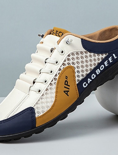  hvite og marineblå sporty joggesko for menn, komfortable snøresko for en aktiv livsstil, ideelle for løping, utendørsaktiviteter og hverdagsbruk