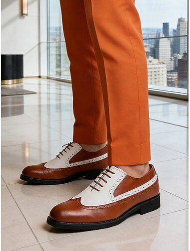  Bruin-witte wingtip herenschoenen – klassieke oxfordstijl, ideaal voor bruiloften en formele gelegenheden.