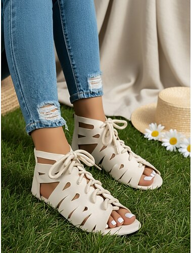 Donkerbruine gladiatorsandalen met vetersluiting en uitsparingen voor dames - trendy, casual platte schoenen voor wandelingen door de stad en dagelijkse zomeractiviteiten.