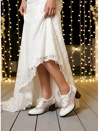  Ivoren damesoxfords met veters en blokhak, elegante vintage-geïnspireerde bruidsschoenen voor een chique stadsbruiloft