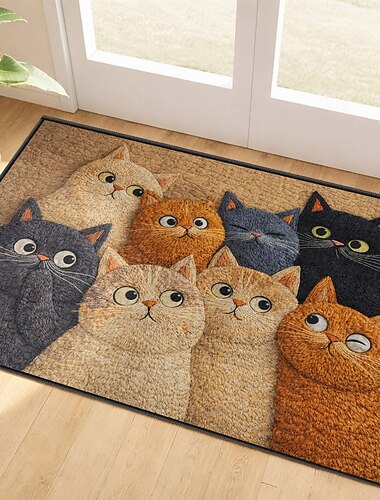  フェイク刺繍の猫の玄関マット。遊び心のある猫をテーマにしたウェルカムマット。丈夫で長持ちする品質。家の入り口に最適。