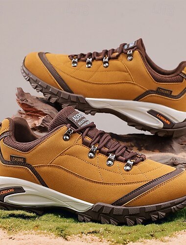  Tênis masculino para trilhas e atividades ao ar livre, com cadarço, em couro sintético resistente e respirável, perfeito para aventuras, viagens e uso casual no dia a dia.