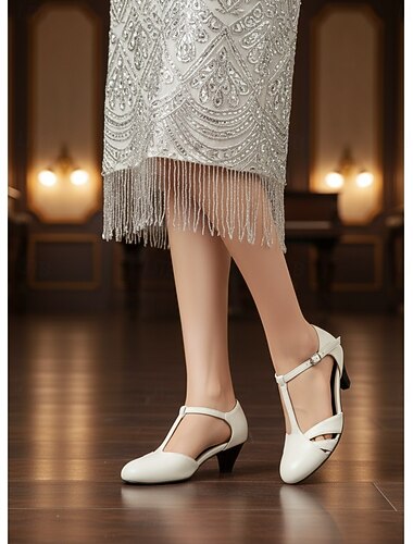  1920年代風グレートギャツビー風レディースブラックフェイクレザーメリージェーンシューズ - 華やかな20年代のパーティーやスウィングダンスにぴったりの、ヴィンテージフラッパースタイルのTストラップミッドヒール、つま先が閉じたデザイン。 &オフィスウェア