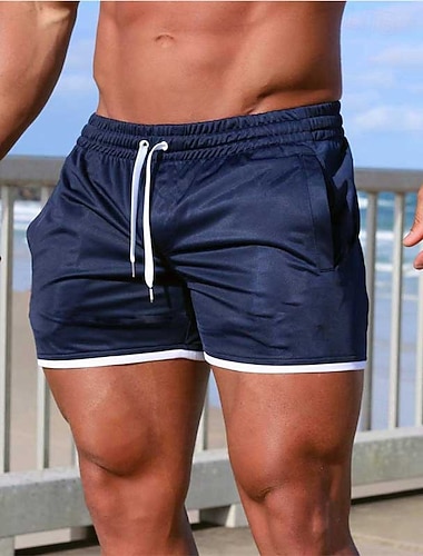  Miesten Surffishortsit Uimashortsit Uimahousut Yhtenäinen Kurenauha Taskut Nopea kuivuminen Taskuilla Surffishortsit Alaosat Lainelautailu Hiekkaranta Vesiurheilu Kesä