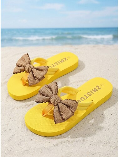  Felgele damesslippers met bruine strik, perfect voor strandvakanties, ontspanning bij het zwembad en zomervakanties.