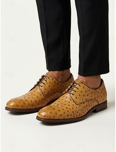  Bruine leren herenschoenen met gesp, bovenwerk met krokodillenprint, klassieke elegante stijl voor bruiloften, formele gelegenheden en kerkbezoek.