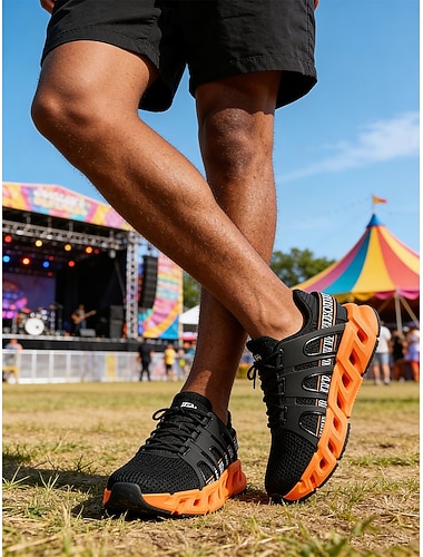 Baskets montantes noires et orange pour homme, respirantes et à lacets, idéales pour les festivals de musique, les concerts, le streetwear, les soirées en extérieur, les tenues tendance et les looks actifs affirmés.