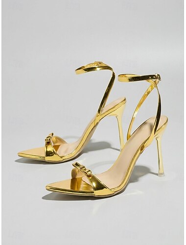 Sandali da donna con tacco a spillo color oro champagne: un accessorio essenziale con cinturino alla caviglia e fiocco, perfetto per feste ed eventi serali.