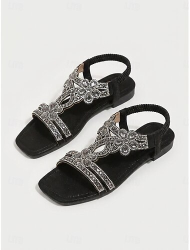  Zwarte, glinsterende sandalen voor dames met strasssteentjes - elegante platte sandalen met bloemenmotief en kralen, en een elastisch enkelbandje, perfect voor buitenvakanties en strandfeesten.