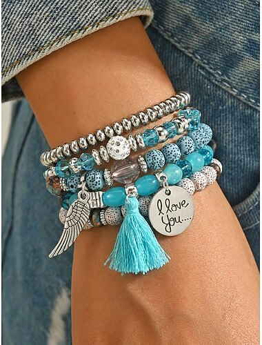  Conjunto de pulseiras femininas boêmias de várias camadas com miçangas – pulseiras coloridas com pingente de borla e asa, perfeitas para ocasiões casuais e praianas.