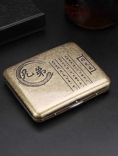 vintage cigarettfodral med båda sidor öppna för att stödja generering av brons kondenserad blommetall flip-top snidade (rymmer 20 cigaretter)