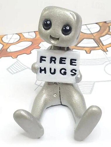 piccola figura di robot con slogan: la tua ansia è un robot bugiardo, decorazioni carine e divertenti per la scrivania dell'ufficio