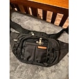 Riñonera impermeable negra: riñonera multibolsillos para viajes, senderismo, running y deportes al aire libre