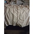 Homme Débardeur Sous-Vêtements T-shirt sans manches Sans manches Henley Été Uni Mode Designer Basique Boutons Vacances Rue Sortir Noir Rose Claire bleu marine T-shirt haut de gamme pour homme