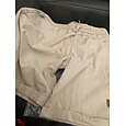 Hombre Pantalones cortos de lino Pantalones cortos de verano Pantalones cortos de playa Correa Cintura elástica Bolsillo con cremallera Plano Un Color Comodidad Suave Longitud de la rodilla Diario