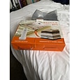 Draadloze reisvacuüm opbergzakkenset met oplaadbare pomp, grijze herbruikbare vacuümzakken, transparante kledingorganizer voor koffers, kledingkasten en reisverpakkingen.